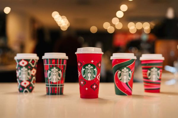 Picture showing 5 Starbucks red cups for the holidays season 2023.